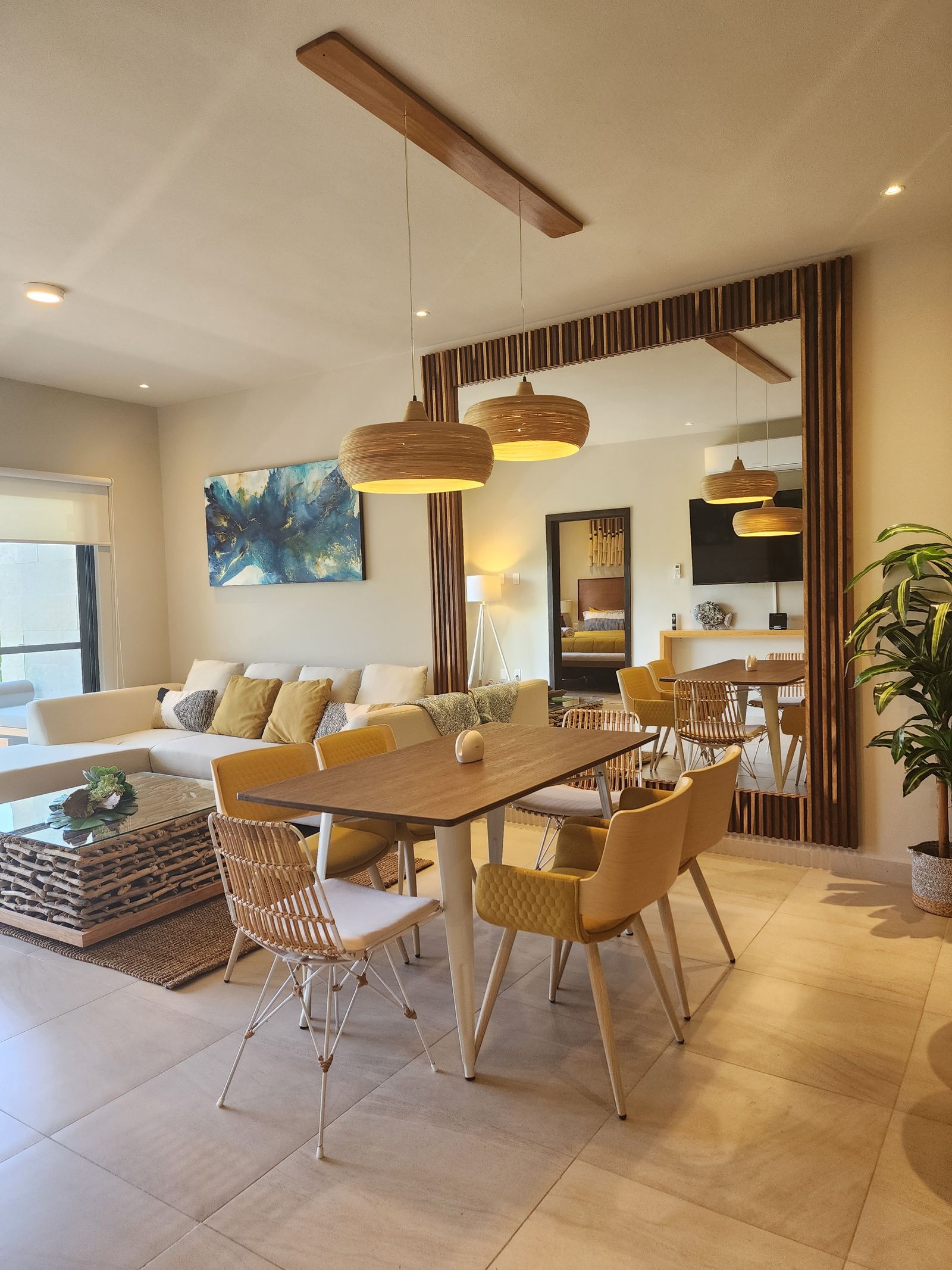 Dining room with wood sideboard, Playa del Carmen condo
